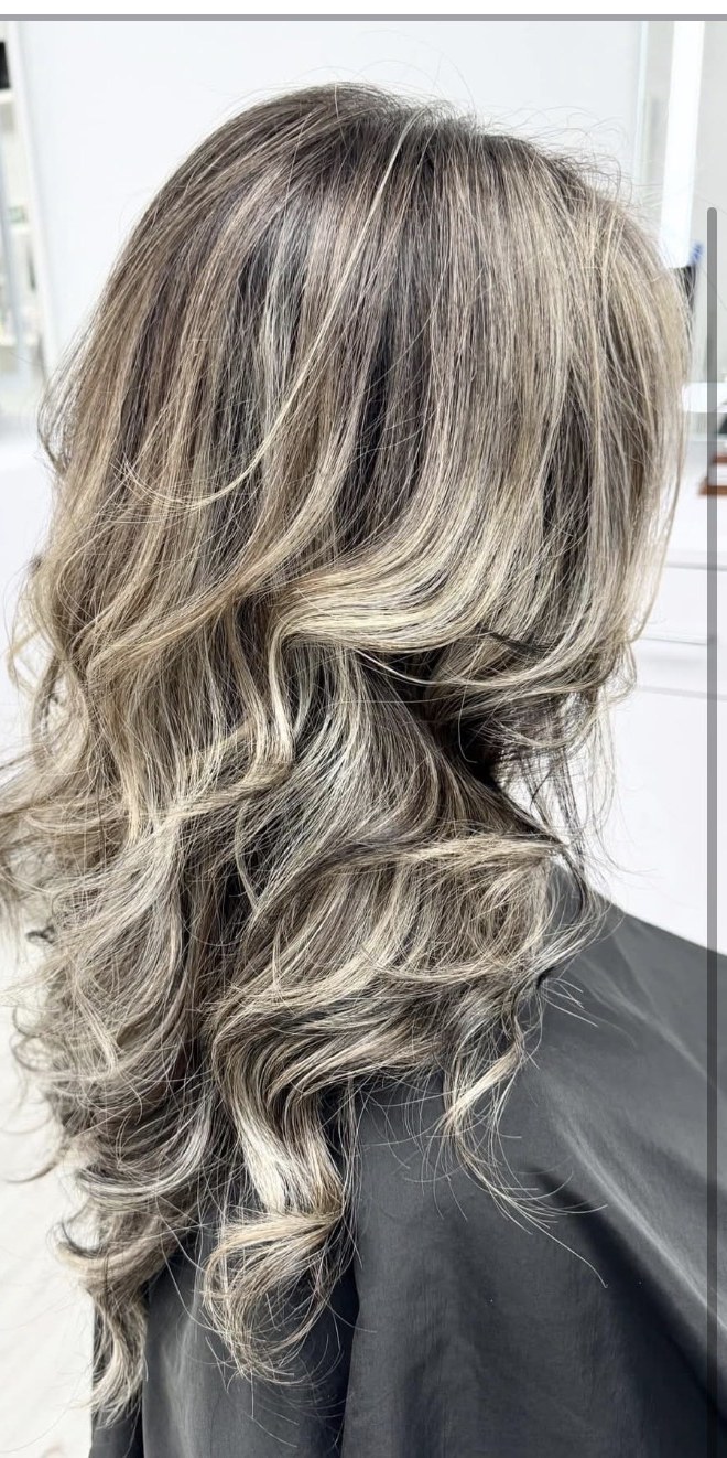Dimensional cool blonde highlights on brunette